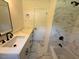 Bathroom featuring a tub, shower, and vanity at 902 Roanoke Ave, Henderson, NC 27536