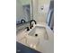 A bathroom sink with marble countertop at 902 Roanoke Ave, Henderson, NC 27536