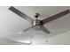 Modern ceiling fan with integrated light fixture and sleek blades adds comfort and style at 902 Roanoke Ave, Henderson, NC 27536