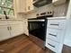 A close-up of the new stainless steel oven at 902 Roanoke Ave, Henderson, NC 27536
