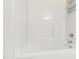 A close-up view of a clean white bathtub with chrome fixtures at 929 Morreene Rd # C31, Durham, NC 27705