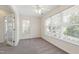 Inviting bedroom with natural light and a ceiling fan at 929 Morreene Rd # C31, Durham, NC 27705
