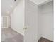 Walk in closet with shelving located near bedroom and living room at 929 Morreene Rd # C31, Durham, NC 27705