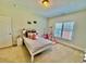 Comfortable bedroom with a window and neutral carpet at 9409 Collingdale Way, Raleigh, NC 27617