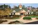 Charming community clubhouse with colorful landscaping and a welcoming entrance at 9409 Collingdale Way, Raleigh, NC 27617