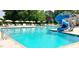 Large community pool featuring a slide and plenty of room for recreation and relaxation at 9409 Collingdale Way, Raleigh, NC 27617
