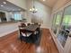Dining room with access to a patio and the kitchen at 9409 Collingdale Way, Raleigh, NC 27617