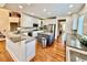 Open kitchen with granite countertops and stainless steel appliances at 9409 Collingdale Way, Raleigh, NC 27617