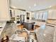Spacious kitchen features granite counters, stainless steel appliances, and a central island at 9409 Collingdale Way, Raleigh, NC 27617