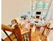 Bright, airy living room with fireplace, hardwood floors, and large windows at 9409 Collingdale Way, Raleigh, NC 27617