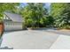 Spacious detached garage with concrete driveway at 106 Wolfs Trl, Chapel Hill, NC 27516