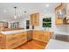 Stylish kitchen with modern countertops, wood cabinets and stainless appliances at 106 Wolfs Trl, Chapel Hill, NC 27516