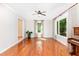 Bright living room featuring hardwood floors and large windows at 106 Wolfs Trl, Chapel Hill, NC 27516