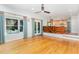 Open floor plan to kitchen and windows surrounding sitting area and lots of natural light at 106 Wolfs Trl, Chapel Hill, NC 27516