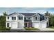 Charming townhome with modern exteriors, garage, and manicured lawns at 10609 Brookside Reserve Rd, Raleigh, NC 27614