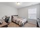 Bedroom featuring carpeted floors, a single bed and natural light at 108 White Burley Ct, Durham, NC 27703