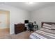 Bedroom with carpet, natural light, desk, and a striped bedspread at 108 White Burley Ct, Durham, NC 27703