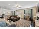 Spacious living room with hardwood floors, comfortable seating, and plenty of natural light at 108 White Burley Ct, Durham, NC 27703