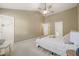 Spacious bedroom features high ceilings, fan, neutral colors and Primary bathroom access at 110 Benedum Pl, Cary, NC 27518