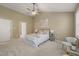 Open bedroom features high ceilings, fan, natural light and neutral color scheme at 110 Benedum Pl, Cary, NC 27518