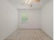 Well-lit bedroom featuring neutral carpet and paint providing a calming atmosphere at 110 Benedum Pl, Cary, NC 27518