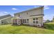 Backyard featuring a screened in patio, and a spacious well manicured lawn at 1100 Balsawood Dr # 5, Durham, NC 27705