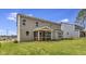 Backyard featuring a screened in patio, and a spacious well manicured lawn at 1100 Balsawood Dr # 5, Durham, NC 27705