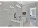 Elegant bathroom featuring a soaking tub, a glass-enclosed shower, and neutral tones at 1100 Balsawood Dr # 5, Durham, NC 27705