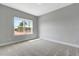 Neutral bedroom with carpet and natural light from a window at 1100 Balsawood Dr # 5, Durham, NC 27705