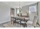 Elegant dining room with modern lighting, decor, and shiplap wall creates a warm atmosphere at 1100 Balsawood Dr # 5, Durham, NC 27705