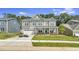 Charming two-story home with a well-manicured lawn and attached two car garage at 1100 Balsawood Dr # 5, Durham, NC 27705