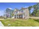 Beautifully landscaped front yard, covered front porch and manicured green lawn at 1100 Balsawood Dr # 5, Durham, NC 27705