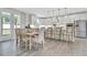 Open concept kitchen, dining area, and access to the back patio at 1100 Balsawood Dr # 5, Durham, NC 27705
