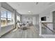 Bright living room featuring hardwood floors, natural light, and comfortable seating at 1100 Balsawood Dr # 5, Durham, NC 27705