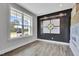 Bright office space with large window, modern design, and view of exterior, perfect for work at 1100 Balsawood Dr # 5, Durham, NC 27705