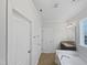 Bathroom featuring a soaking tub and a separate granite vanity at 120 Martingale Dr, Holly Springs, NC 27540