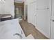 Bathroom with a soaking tub, a granite vanity, and a glass shower at 120 Martingale Dr, Holly Springs, NC 27540