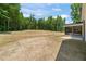 Home featuring a spacious backyard with a screened-in porch at 120 Pilot Ridge Rd, Zebulon, NC 27597