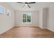 Bright bedroom with hardwood floors, large windows, and ample natural light at 120 Pilot Ridge Rd, Zebulon, NC 27597