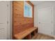 Bright mudroom with a wood bench and built in window to let light in at 120 Pilot Ridge Rd, Zebulon, NC 27597