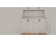 Custom pantry featuring granite countertops, white cabinets, and storage at 120 Pilot Ridge Rd, Zebulon, NC 27597