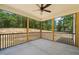 Screened-in patio overlooks an expansive backyard, offering a seamless indoor-outdoor living at 120 Pilot Ridge Rd, Zebulon, NC 27597