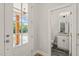 Stylish powder room with granite countertop, decorative mirror, and modern fixtures at 120 Pilot Ridge Rd, Zebulon, NC 27597