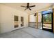 The screened in porch has a ceiling fan and has an open view to the back at 120 Pilot Ridge Rd, Zebulon, NC 27597