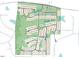 A detailed aerial view showcases the layout of a vibrant residential community at 1201 Michelle Mist Way, Apex, NC 27523