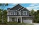 Charming two-story home with stone accents, a covered porch and a well-manicured front lawn at 1201 Michelle Mist Way, Apex, NC 27523