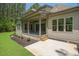 Comfortable back porch leads to patio and large backyard at 1212 Perry Bluff Dr, Wake Forest, NC 27587