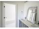 Bright bathroom with double vanity and tiled shower at 1212 Perry Bluff Dr, Wake Forest, NC 27587