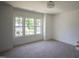 Bedroom with carpet, large window, and lots of light at 1212 Perry Bluff Dr, Wake Forest, NC 27587