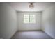 Bedroom featuring carpeted floors and a large window at 1212 Perry Bluff Dr, Wake Forest, NC 27587